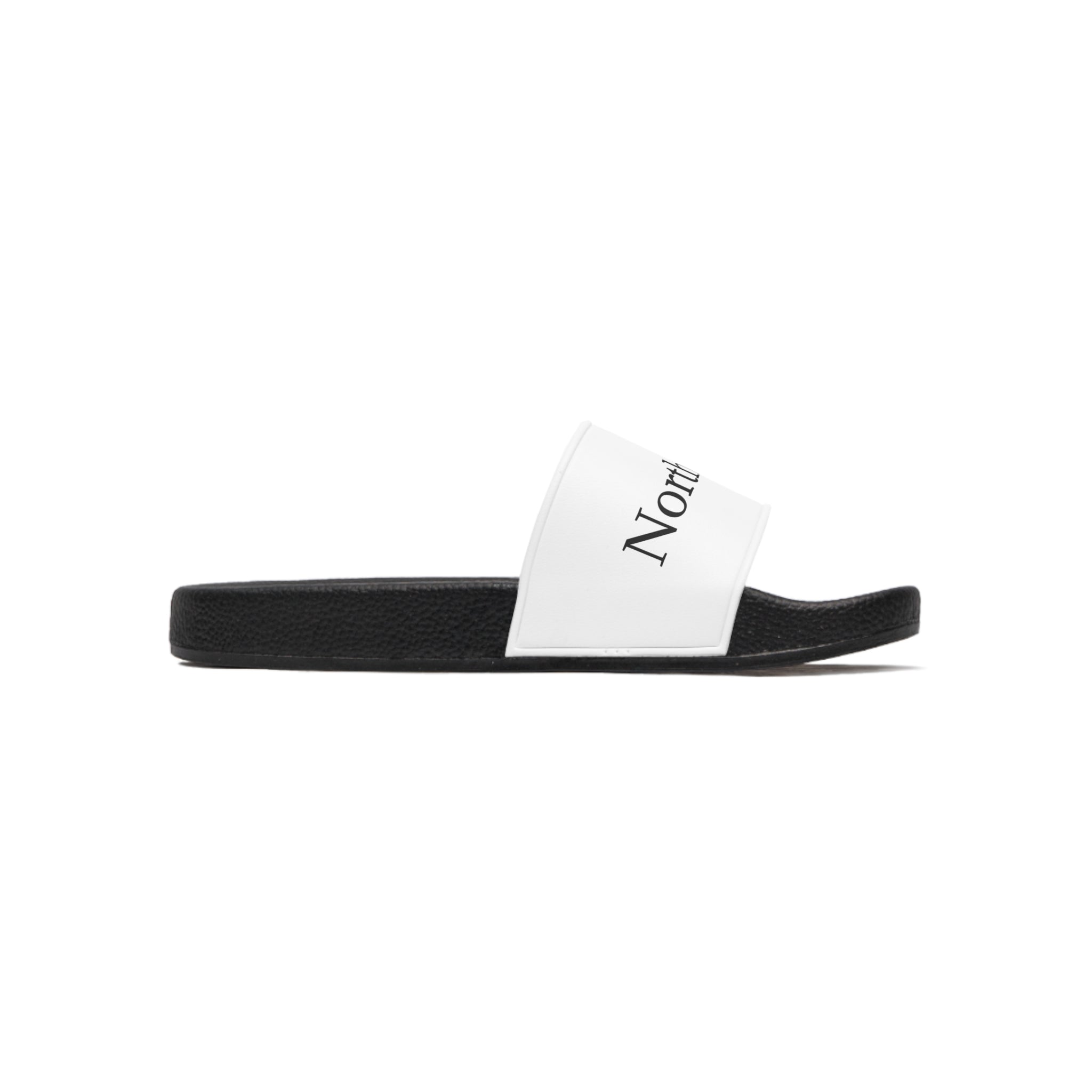 side view of the  Black slide sandal 