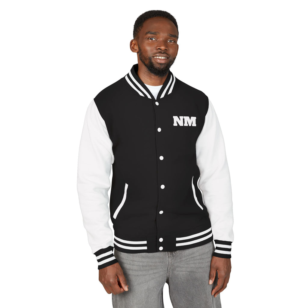 person wearing Black and white varsity jacket with embroidered logo NM