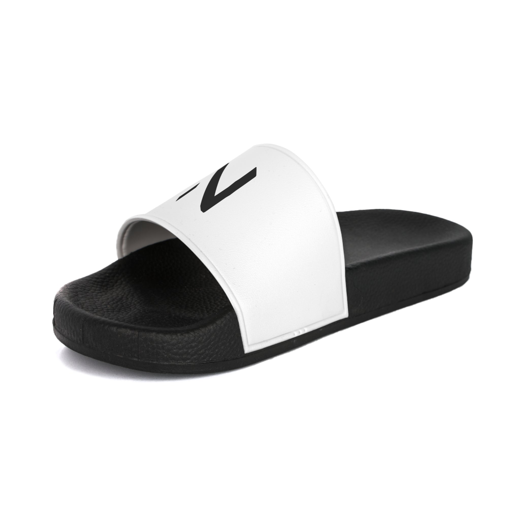 side view of the Black and white slide sandal 