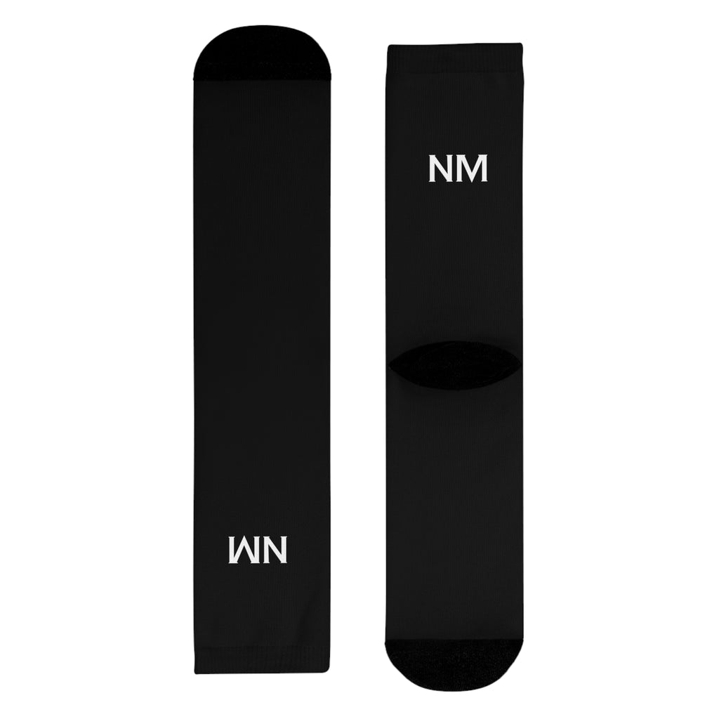 Black socks with 'NM' branding