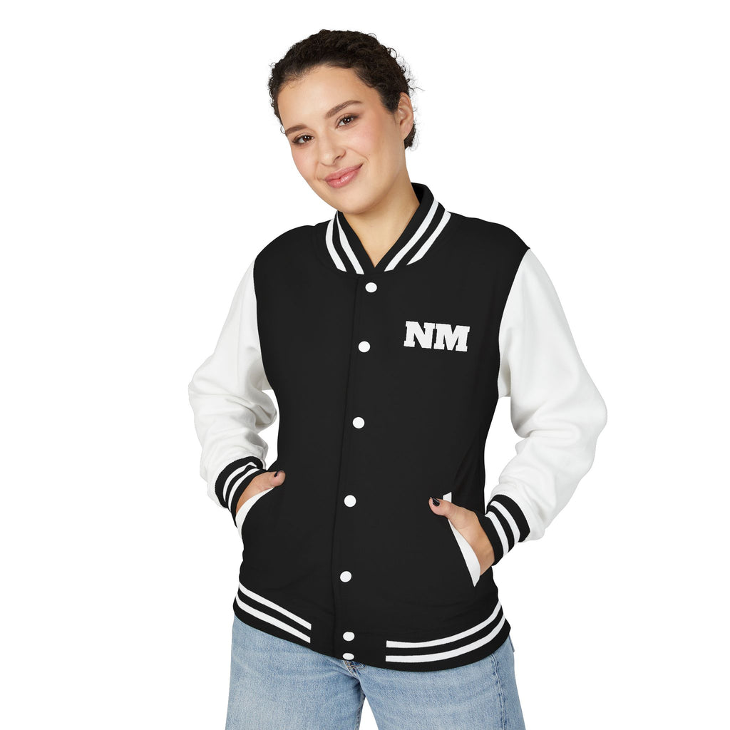 person wearing Black and white varsity jacket with embroidered logo NM