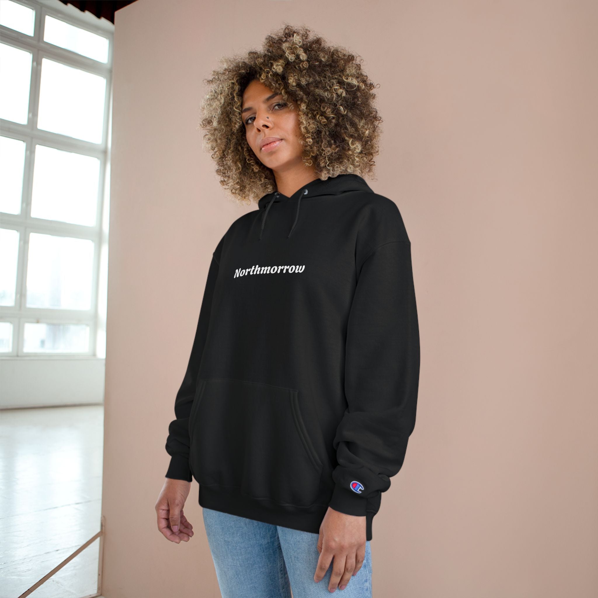 Person wearing a black hoodie 