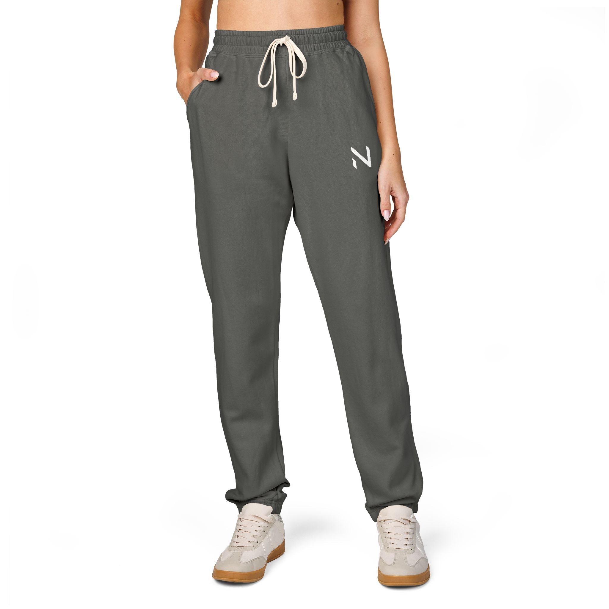 Gray sweatpants with a logo on a  person